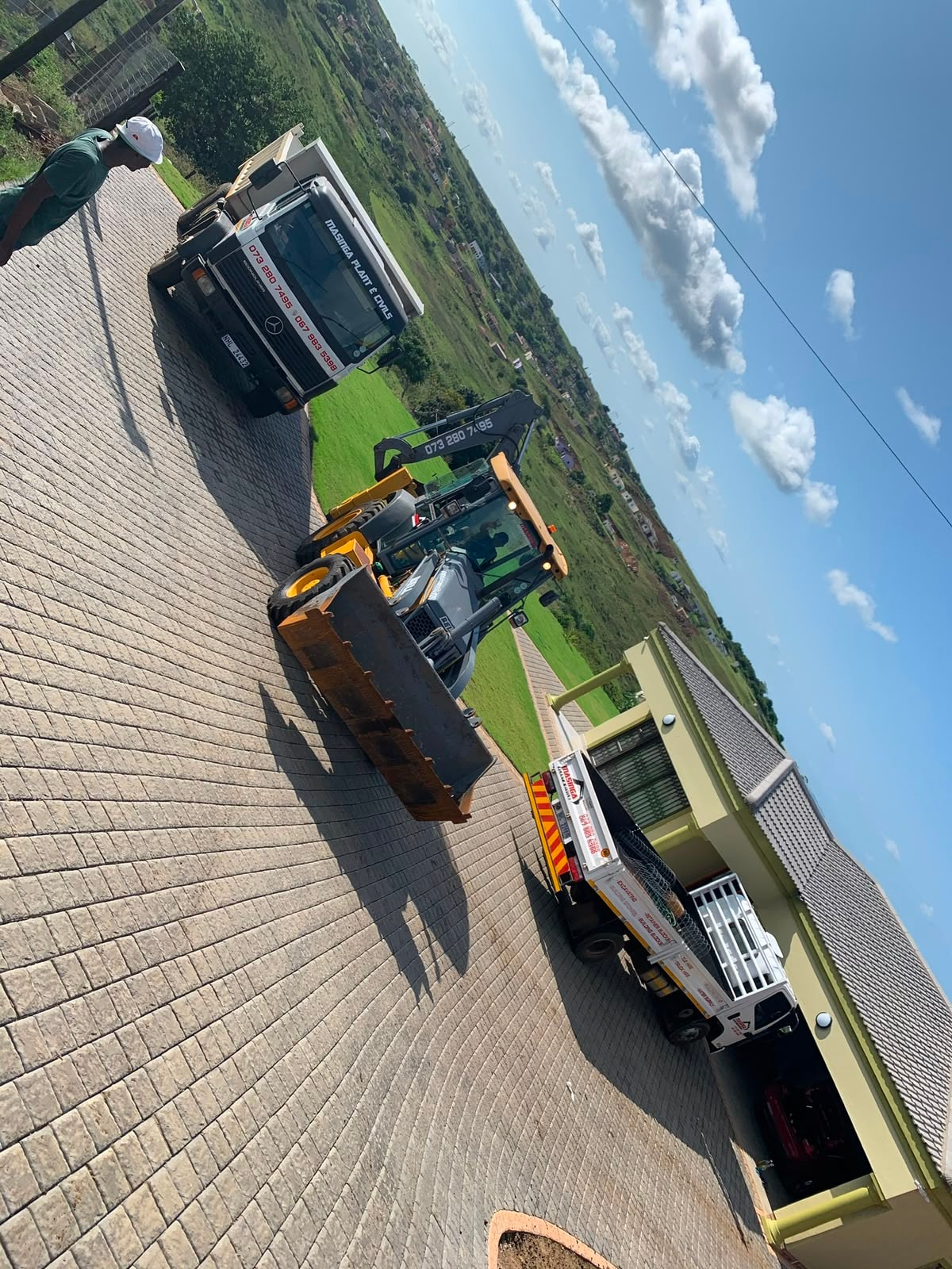 Masinga Plant & Civils branded truck and TLB fleet